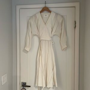 White woman’s tie waist dress